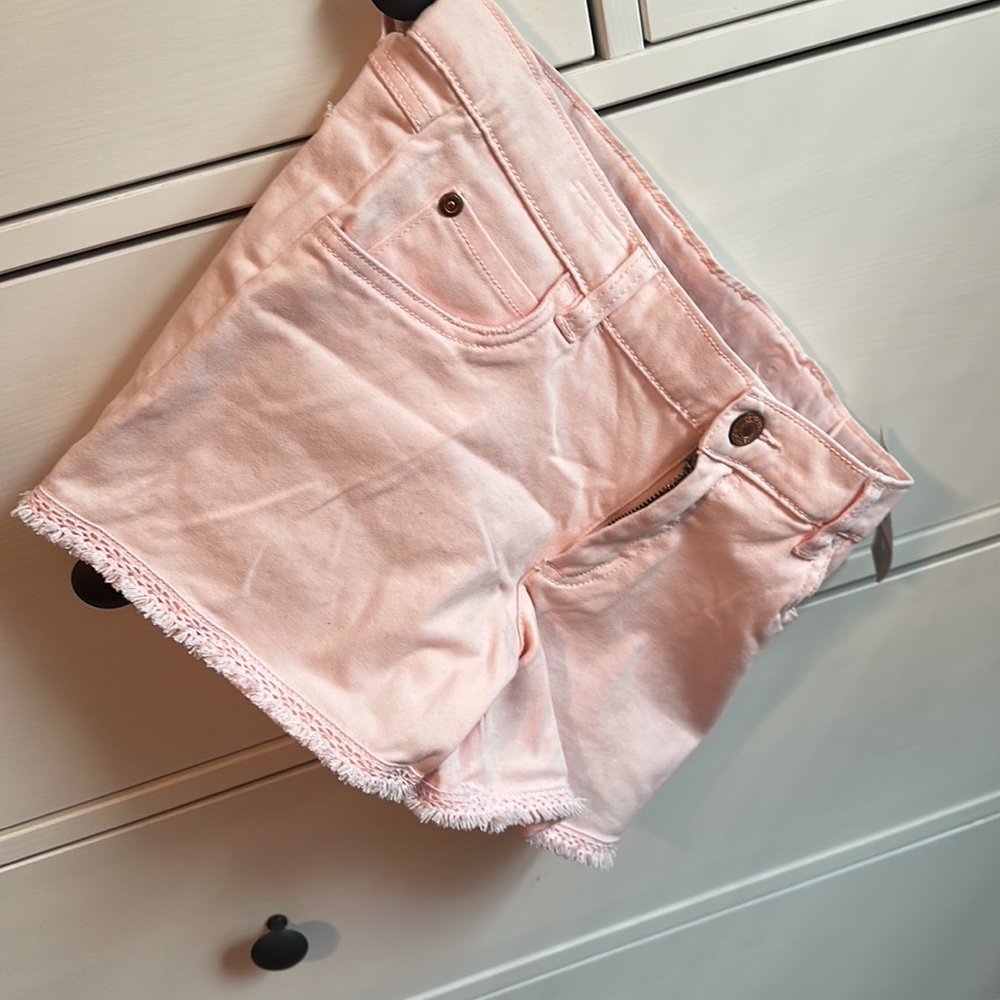 NWT Carter’s Pink jean shorts with lace trim , size 10